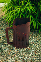 Feuerkorb aus Metall im Bierkrugdesign aus Edelrost Rostdeko Gartendeko